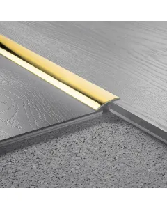 Azonos szintű burkolatokhoz rögzítés módja: ragasztás anyaga: sárgaréz mérete: 100 x 3 cm